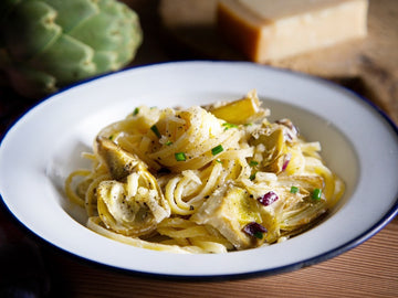 A bowl of Spaghetti Al Limone with Grilled Artichokes
