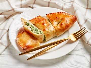 BROCCOLI + CHEDDAR CALZONES